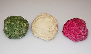 Green dough, white dough, and red dough