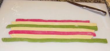 Adjacent colored pasta strips