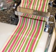 Rolling overlaid colored pasta strips