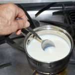 Heating milk to make yogurt