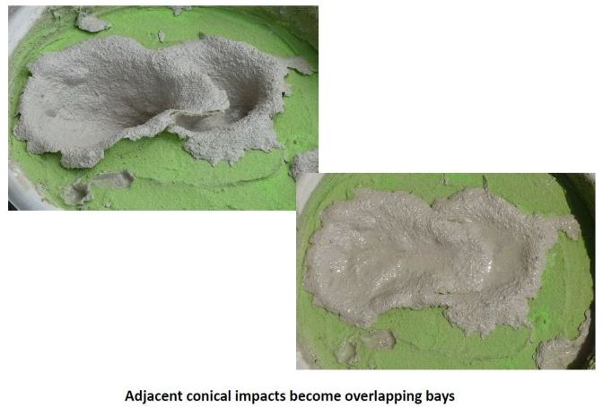 adjacent conical impact cavities transform into overlapping bays